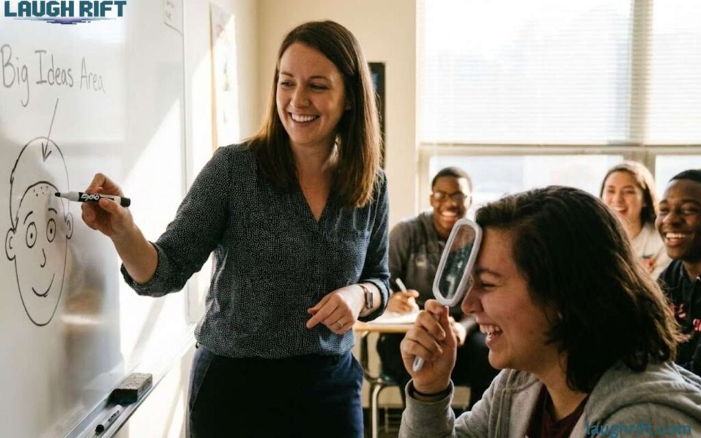Teacher tapping large forehead in front of chalkboard.